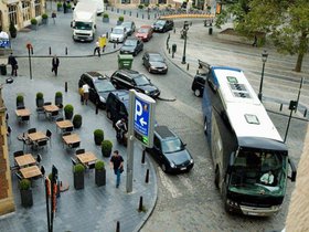 A bus decides to block two lanes of traffic on a c.jpg